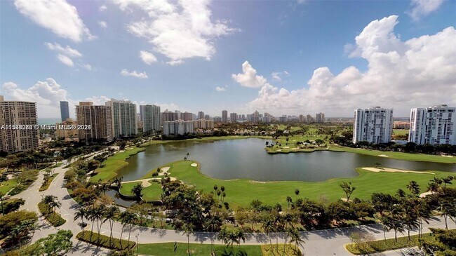 Building Photo - 3675 N Country Club Dr