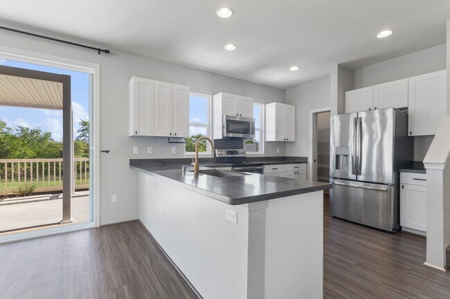 Foto del edificio - Bright 4-Bedroom Pet-Friendly Golf-Course ...
