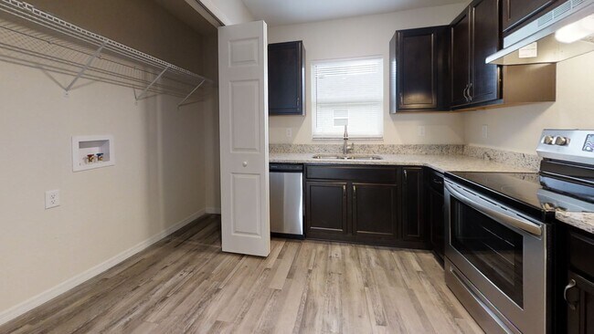 Building Photo - Available Now! Beautiful 2BR/2BA Quad for ...