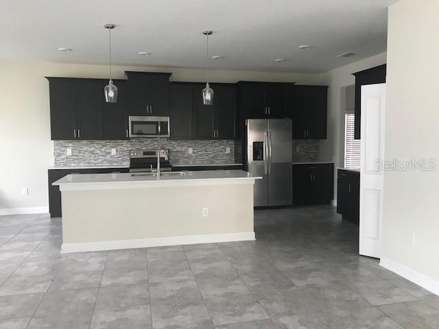 Foto del edificio - 15061 Evergreen Oak Loop