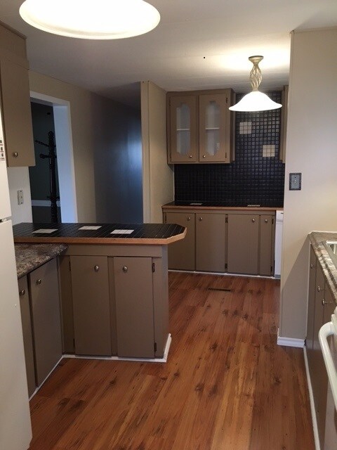 Photo du bâtiment - 3 Bed 2 Bath Unit in Didsbury, AB