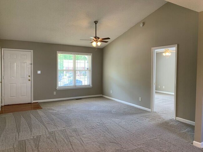 Building Photo - NE Brick Home, Vaulted Ceilings, Front Por...