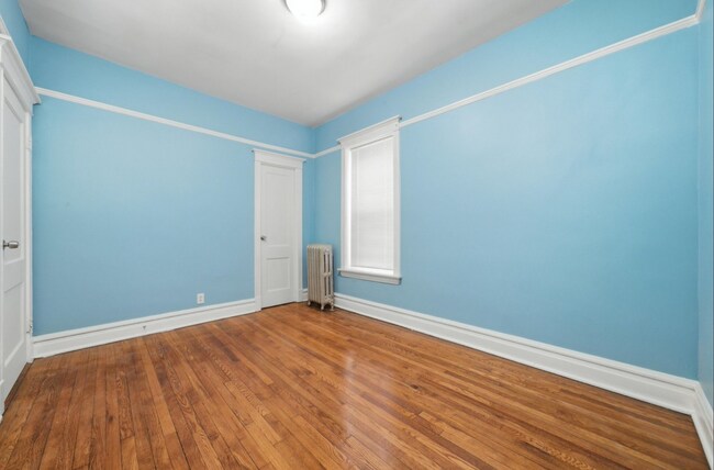 Building Photo - 7442 S Langley Ave