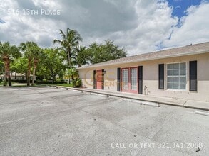 Building Photo - 516 13th Pl
