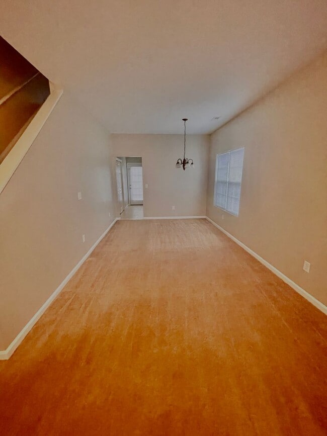 Foto del edificio - This two-story, 4-bedroom, 2-bath duplex in Fort Mill, SC sits on a corner lot