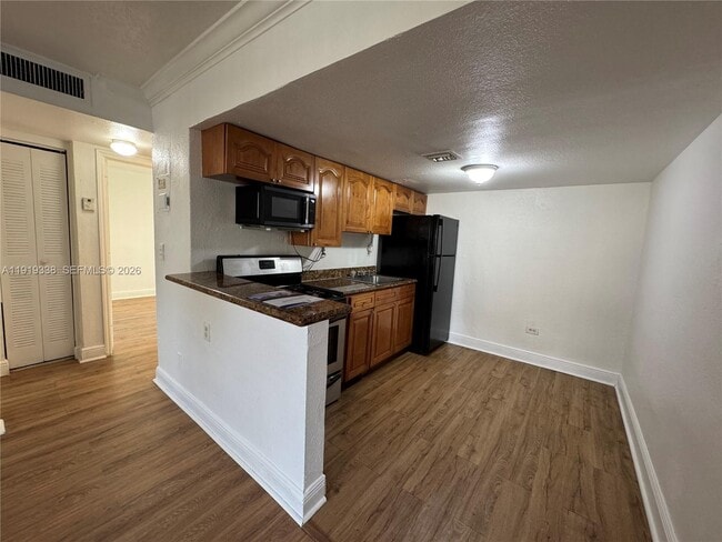 Building Photo - 241 S Royal Poinciana Blvd