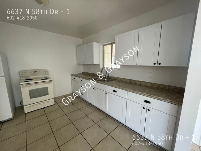 Foto del edificio - 6637 N 58th Dr