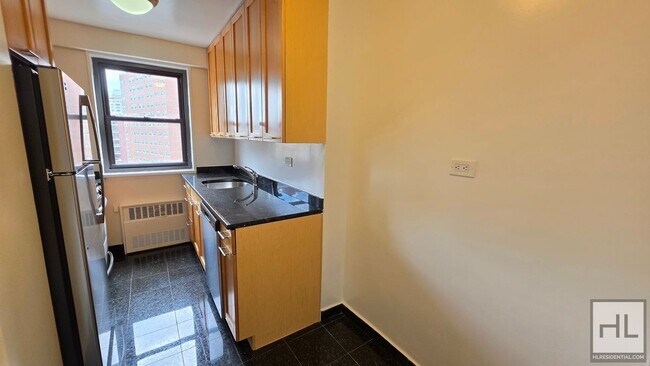 Foto del edificio - Sunlit 11th-Floor 1-Bed with Sweeping City Views by Union Square