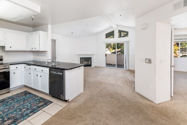 Building Photo - Upstairs, end unit 2 bedroom condo.
