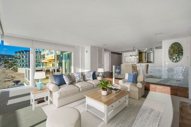 Building Photo - Stunning Ocean Front Oasis! 3 bedroom 2 bath condo with private steps to beach!