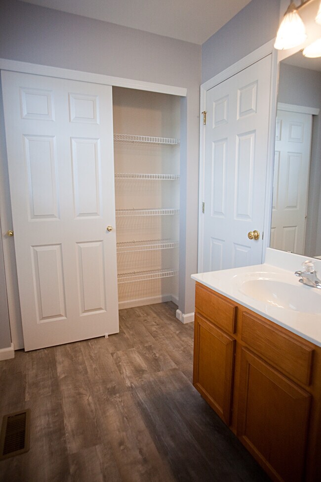 Second floor main bath with large linen closet. - 309 Burning Brook Dr
