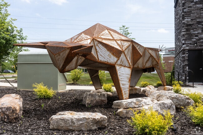 A local artist constructed this metal bull outside of a commercial building in Huntersville.