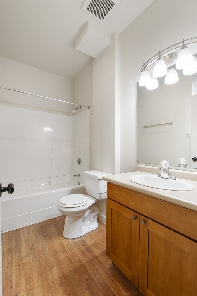 Studio bathroom with shower/tub combo! - Milwaukee Apartments