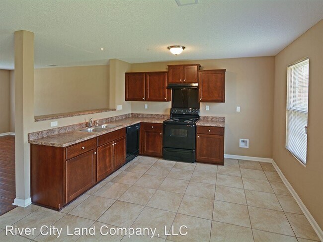 Building Photo - 3 br, 2.5 bath House - 4571 Tulip Creek Dr