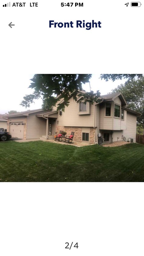 Front - 11022 Quebec Ave N