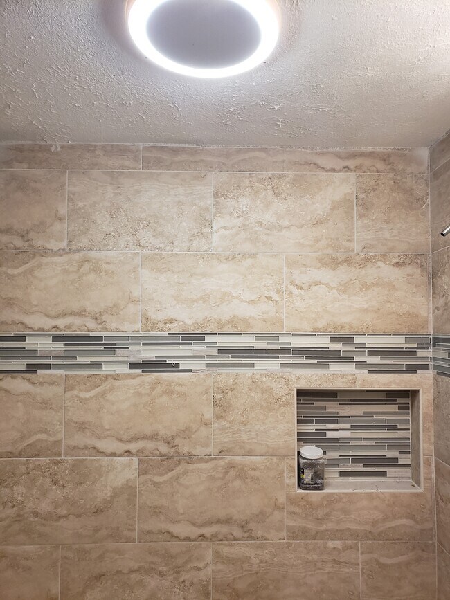 Custom walk in shower w mosaic design - 6628 Avenue P