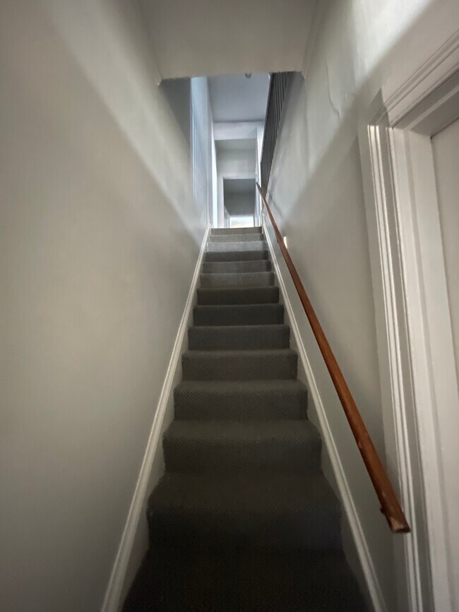 Stairway to second floor unit - 523 N 7th St