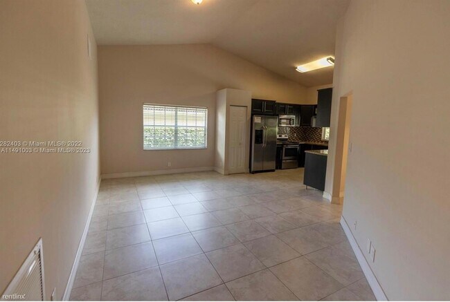 Foto del edificio - 3 br, 2 bath House - 10428 NW 9th Mnr # 10428