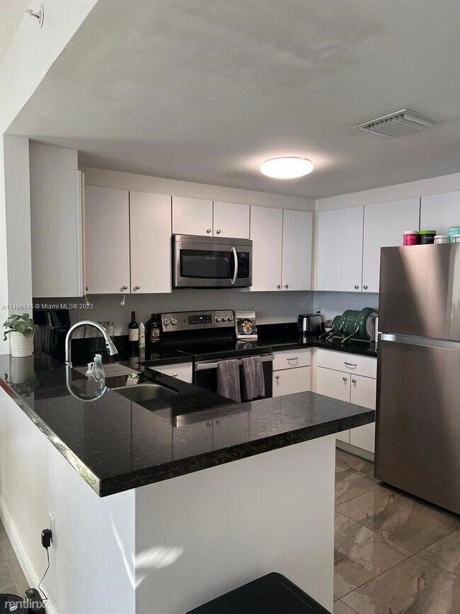 Foto del edificio - 1 br, 1.5 bath Condo - 1250 S Miami Ave Ap...