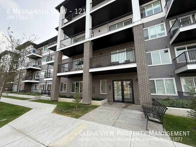 Photo du bâtiment - Stunning brand-new, never-lived-in 2 bedroom + den, 2 bathroom condo in Chestermere!! **PROMO: 1S...