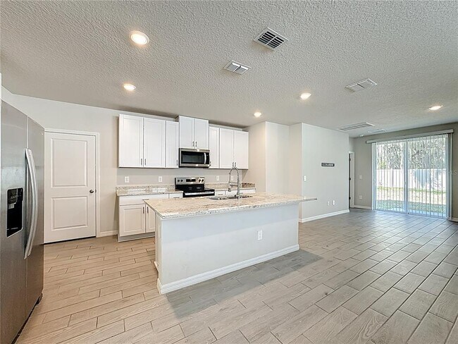 Foto del edificio - 7329 Boggy Crk Pl