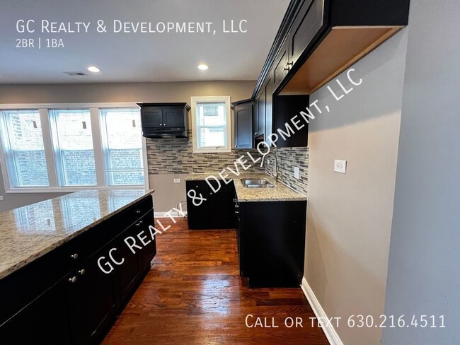 Building Photo - ***2 BDRM / CENTRAL AIR / SHARED GARAGE SP...