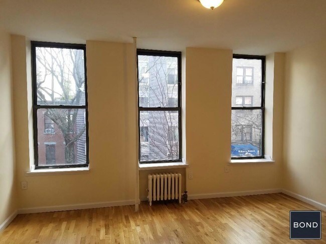 Building Photo - 153 E 117th St