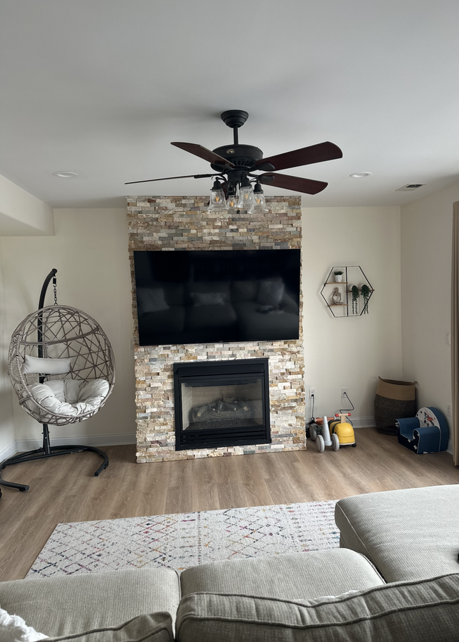 Living Room w/ Gas Fireplace & Mounted 65" - 26 Bowsprit Dr