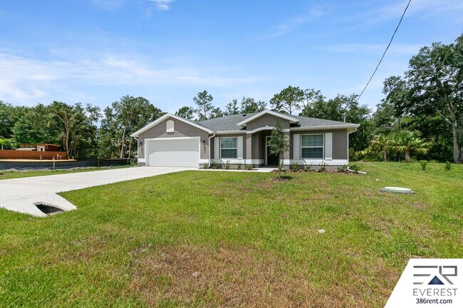 Foto del edificio - LIKE NEW 4/2/2 ON A CUL DE SAC IN BEAUTIFUL SEMINOLE WOODS