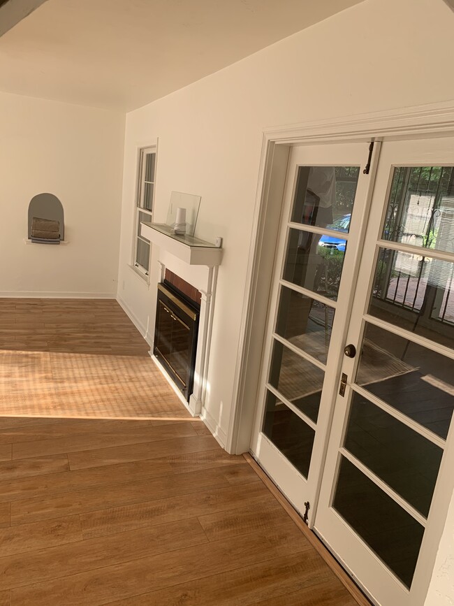 Fireplace and French doors - 3221 NW 14th St