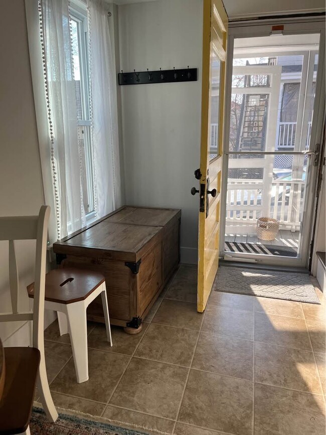 Entry door with furniture - 44 N Spring St