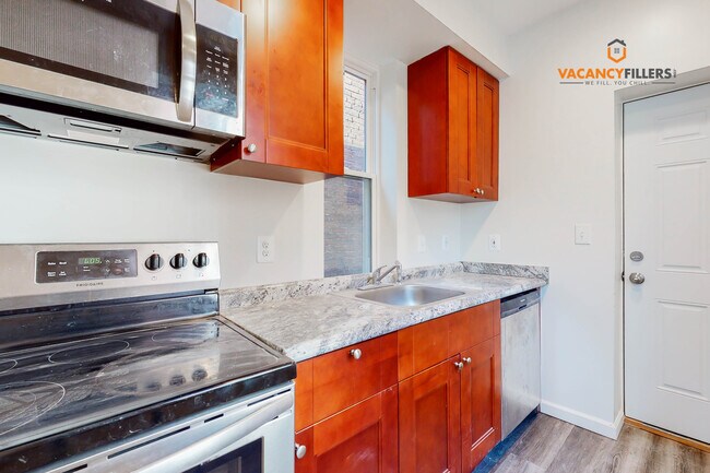 Building Photo - Brand new Studio in Station North w/laundr...