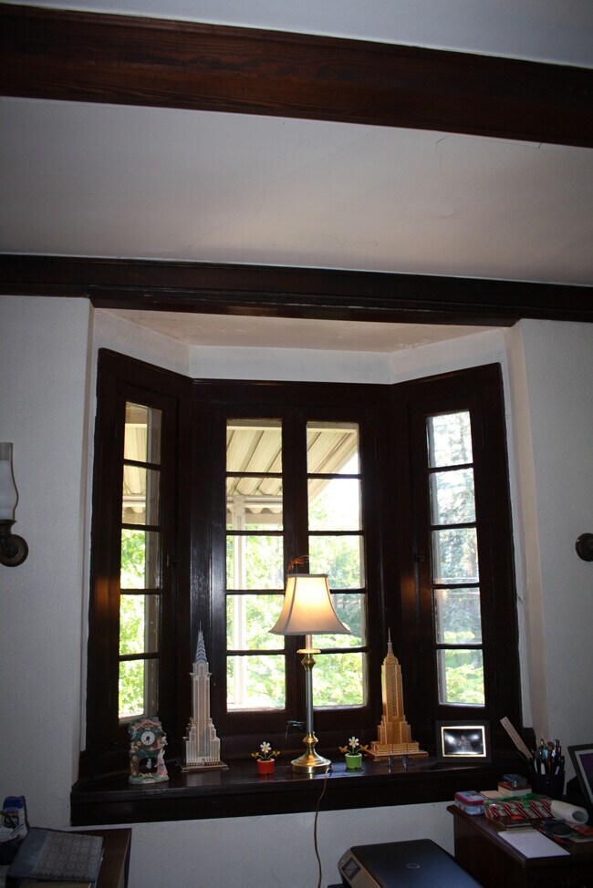 The bay window is just one of the many charming, vintage features. - 334 Thrall St