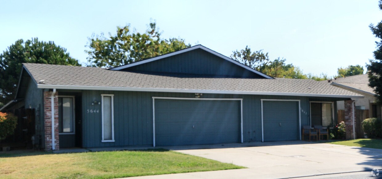Building Photo - 5642-5650 Brush Creek Dr