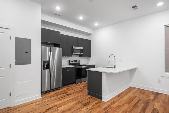 Building Photo - The Gotham Townhome