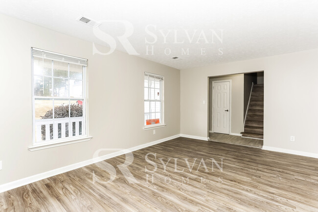 Building Photo - This 5 bedroom, 3.5 bathroom is sure to im...