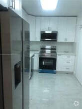 Building Photo - 10185 Collins Ave