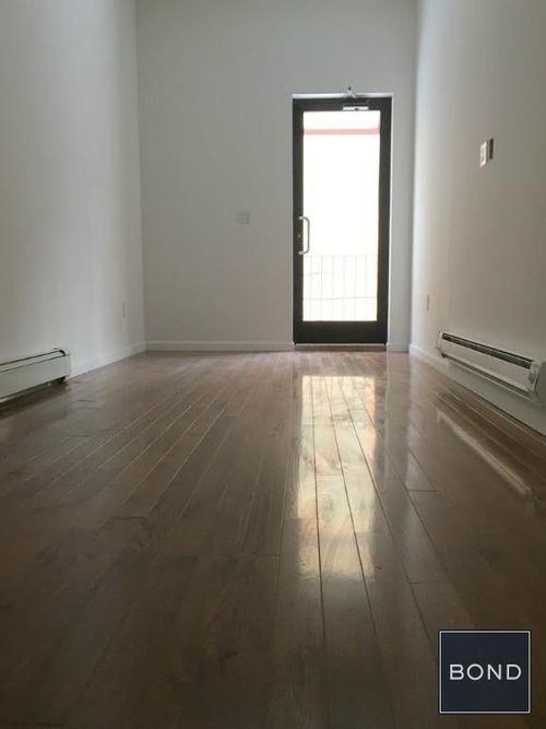 Building Photo - 215 E 115th St