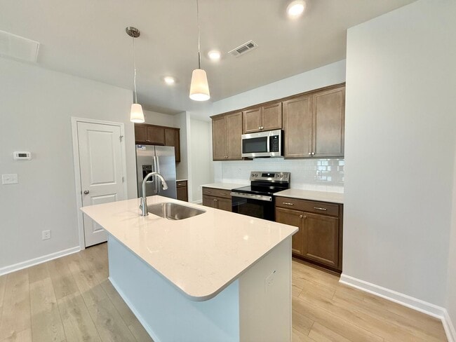 Building Photo - **OFFERING REFUNDABLE APPLICATION FEES** New Construction 3BD, 2.5BA Garner Townhome with a 1-Car...