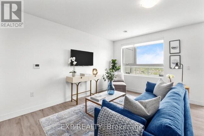 Building Photo - 100-100 Manett Crescent