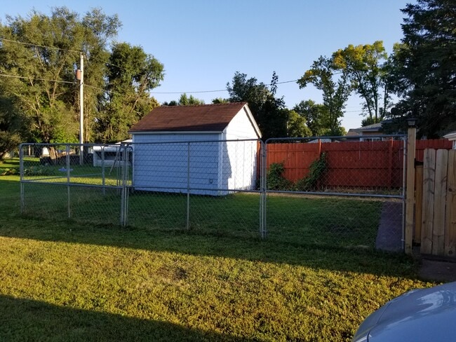 Building Photo - Gray House by Church