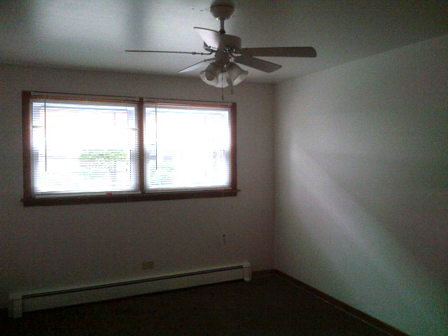 Foto del edificio - 1115-1119 W 127th St
