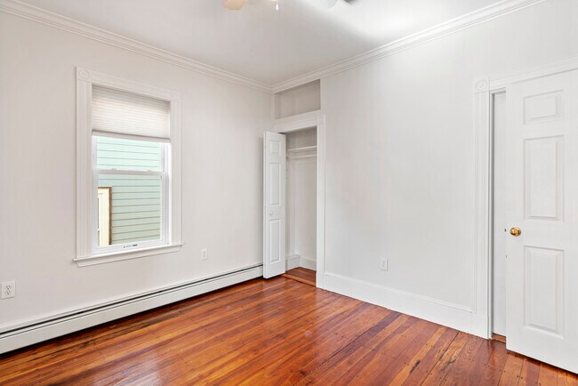 1st Bedroom - Adjacent to living room. - 258 E Cottage St