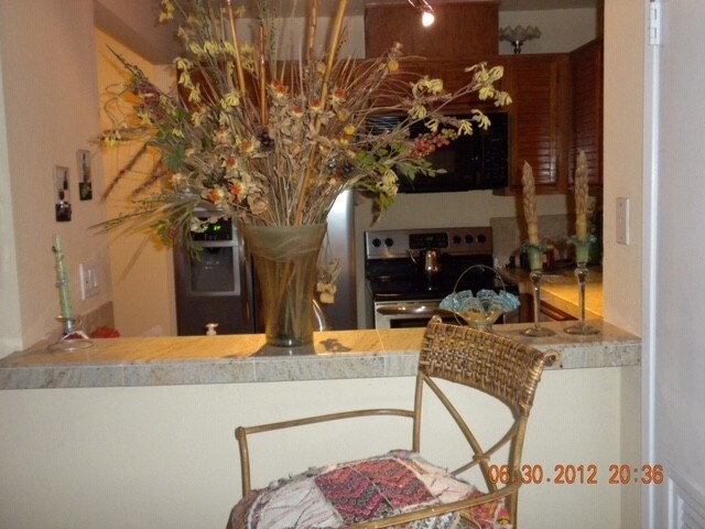 View of kitchen with granite countertops - 25712 Le Parc
