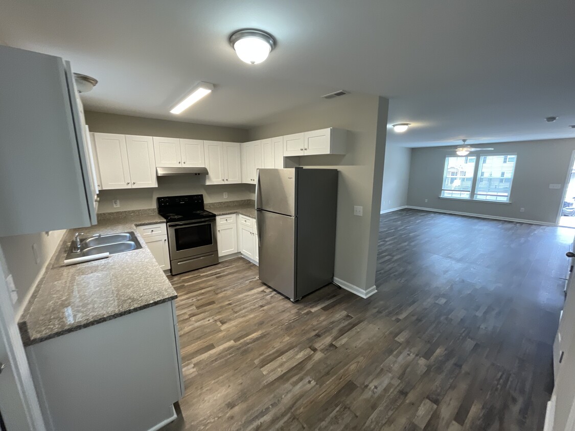 Spacious kitchen with stainless steal appliances and granite countertops - 456 S Church St