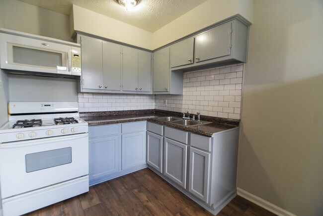 New Cabinets and Countertop - 311 Campbell Ave