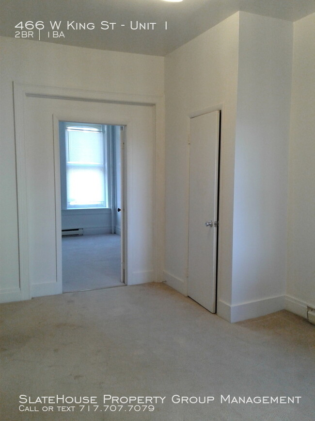 Building Photo - First floor two bedroom with yard!