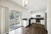 Foto principal - Stylish & Updated Condo with 2-Car Garage ...