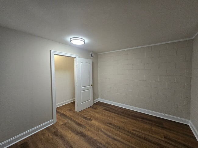 Building Photo - This Basement Retreat Might Be Your Perfect Match - Utilities Included!