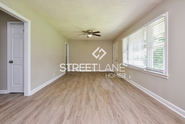 Building Photo - REDUCED! - NOW OFFERING THE FIRST FULL MON...